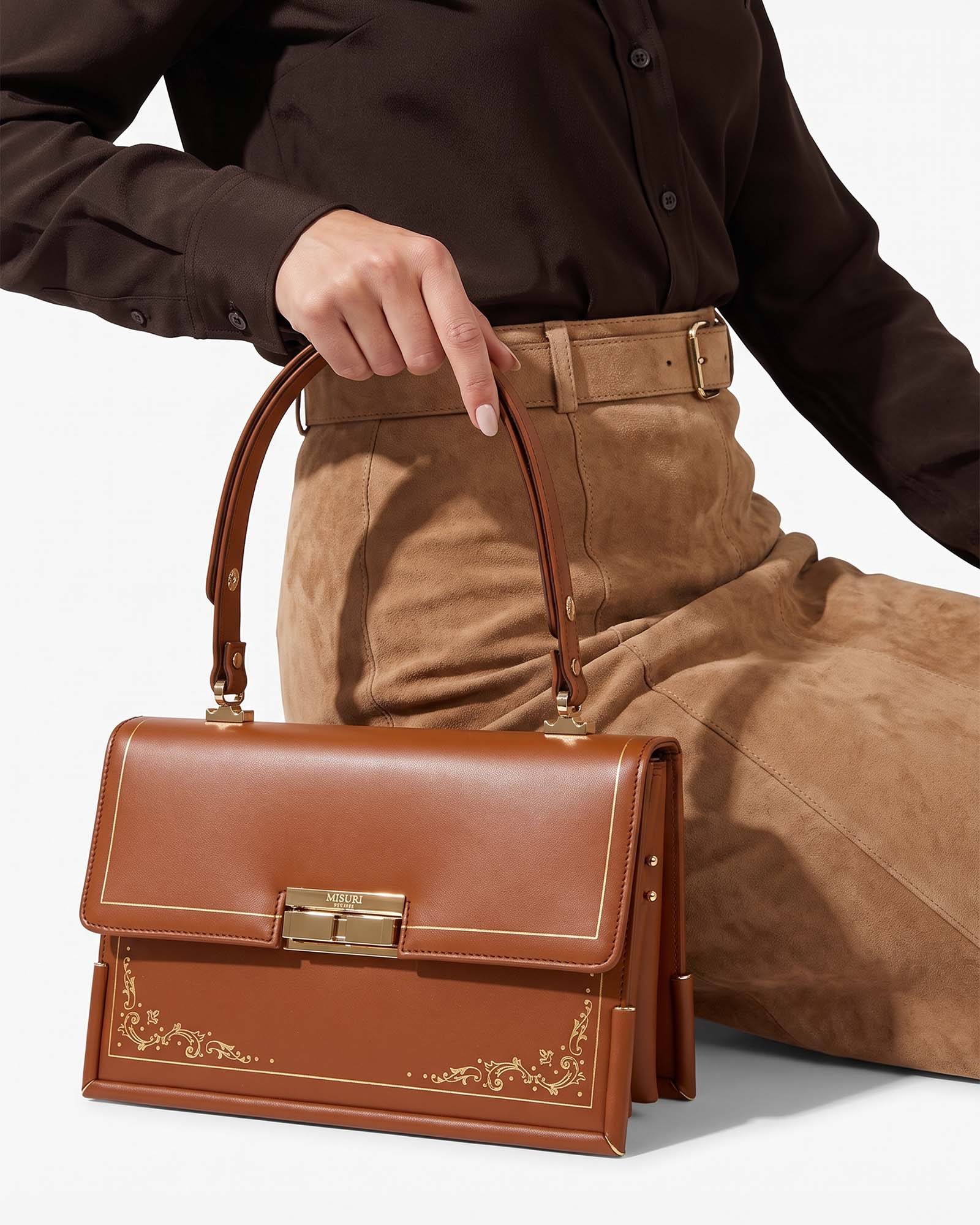 Grace 1957 – Braun mit Goldecke